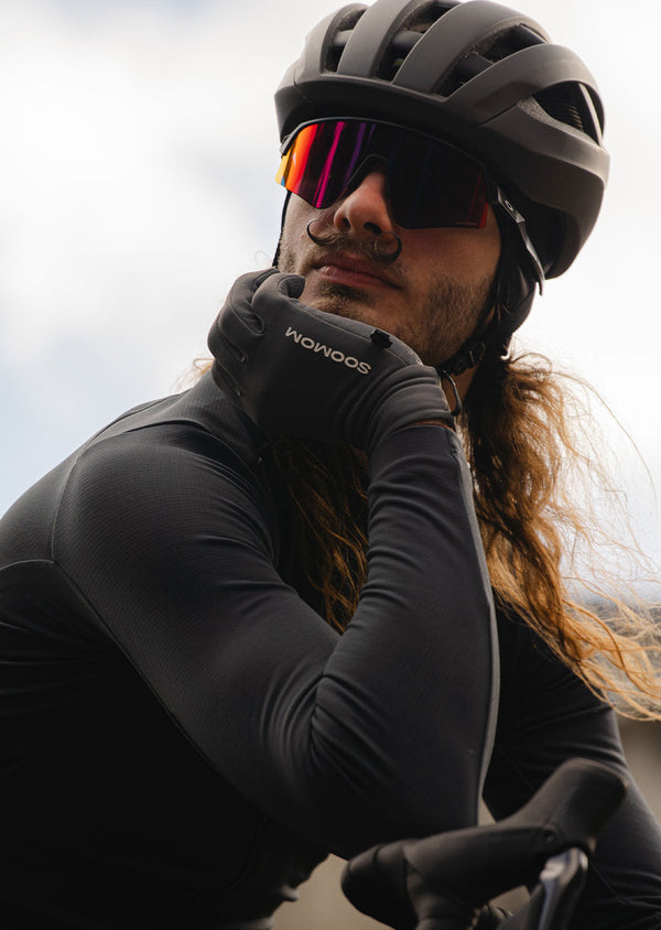 Male cyclist wearing Soomom winter cycling gloves