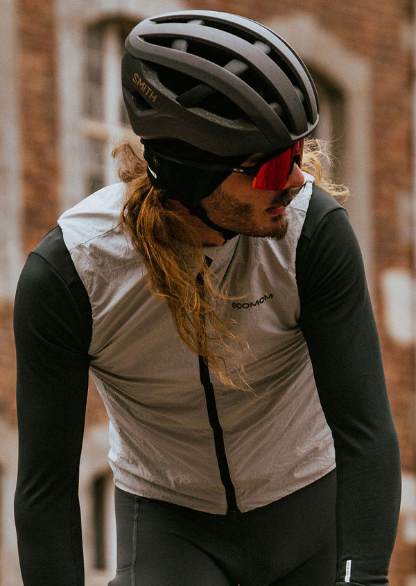 Male cyclist wearing a Soomom thermal headband under his helmet